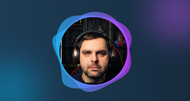 A photograph of Piotr Szwed surround by a circular blue and purple frame.