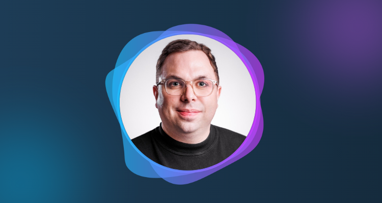 A photograph of Steve Wade surround by a circular blue and purple frame.