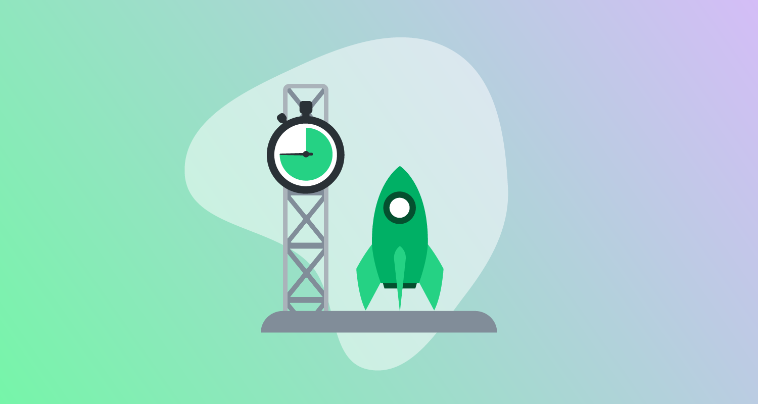 A green rocket on a launch pad next to a