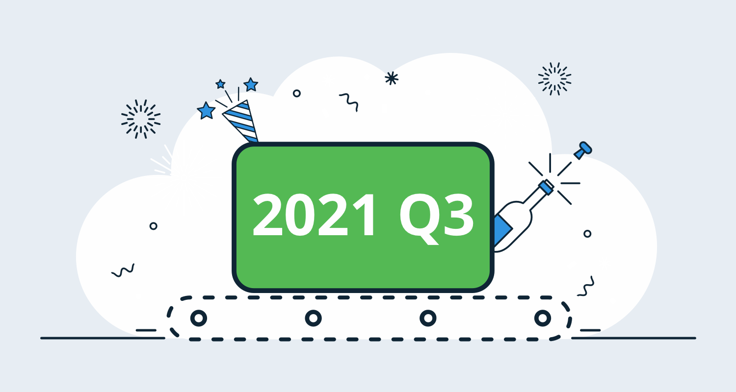 A box labelled 2021 Q3 sits on a conveyor belt against a backdrop of party favors and fireworks.