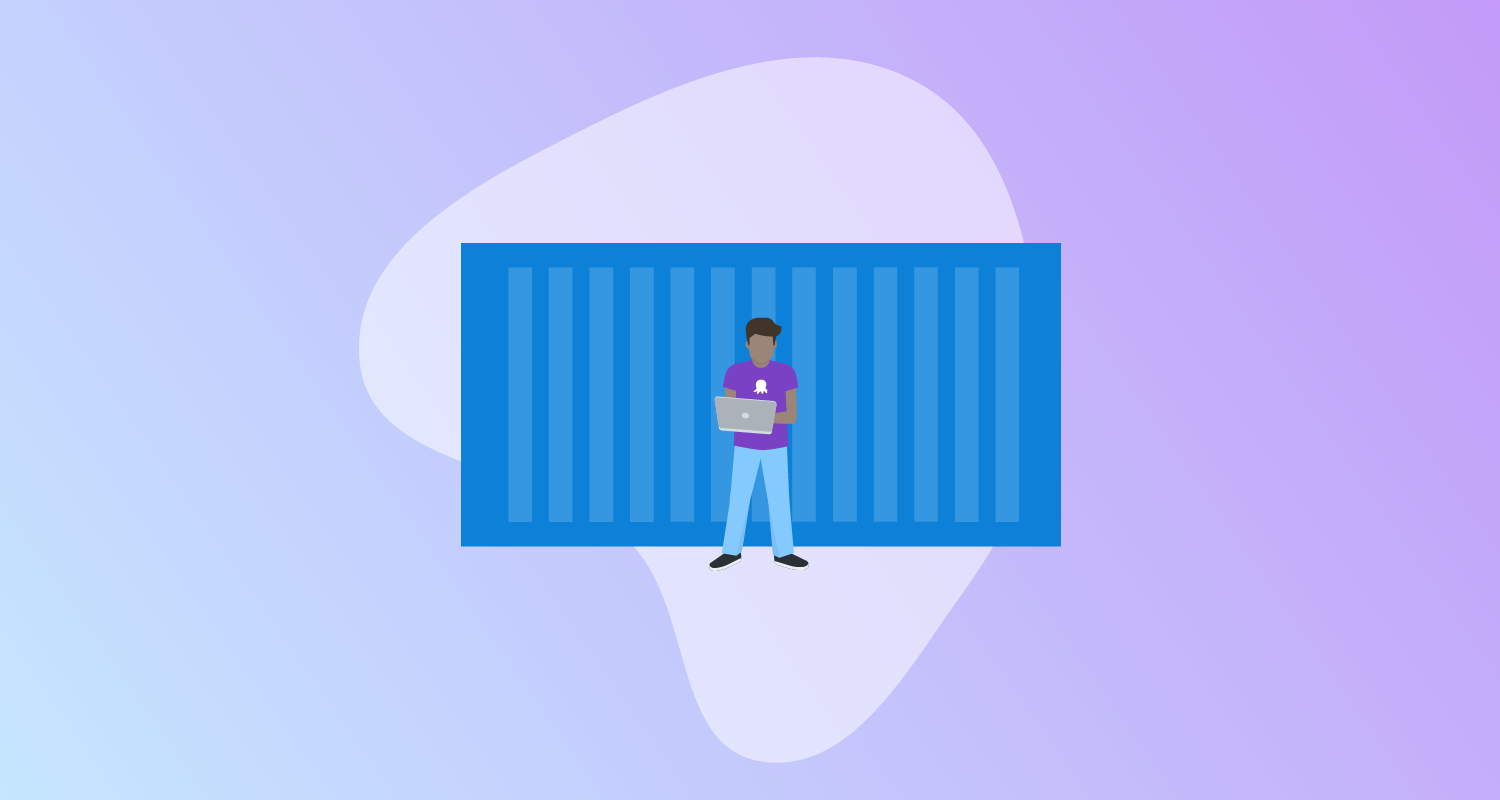 Man standing with a laptop in front of a large blue container.